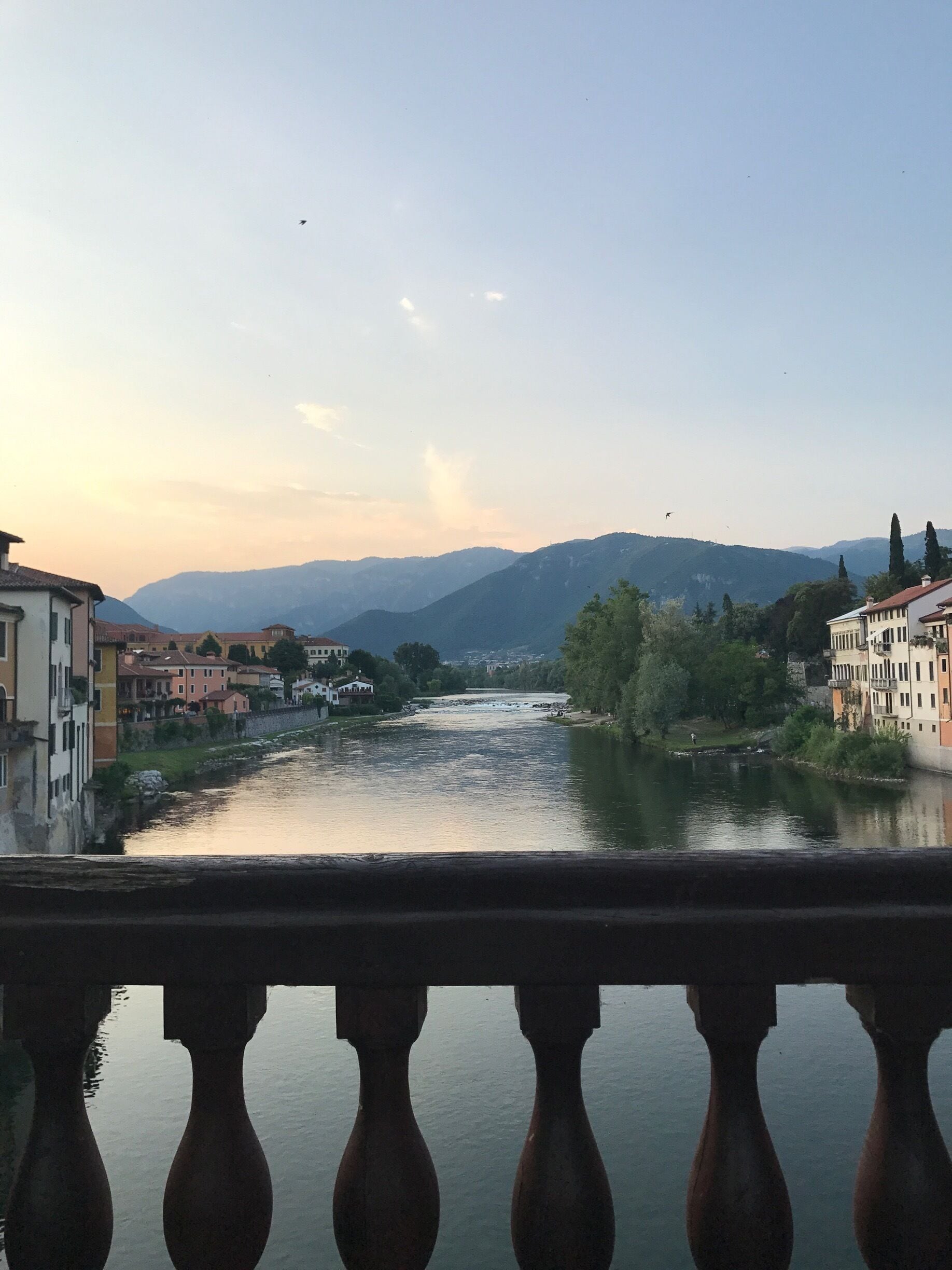 This stunning view is from one of the oldest bridges in Italy. There's a nice bar selling grappa on the bridge. Currently there's restoration work taking place on the bridge. May 2017.