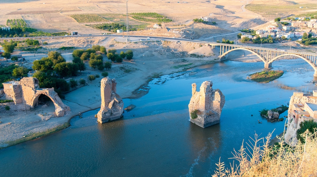 Batman, Turkey. Hasankeyf village (Southeastern Anatolia). Aerial view from the Fortress on the Tigris River with remains of the Old Bridge.