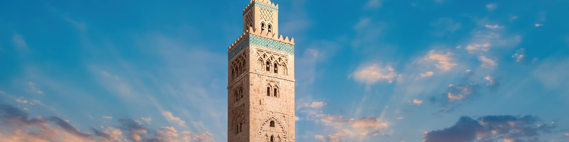 Koutoubia Mosque during sunset. Located at Marrakesh medina quarter, it is the largest and most iconic mosque in Marrakesh, Morocco.