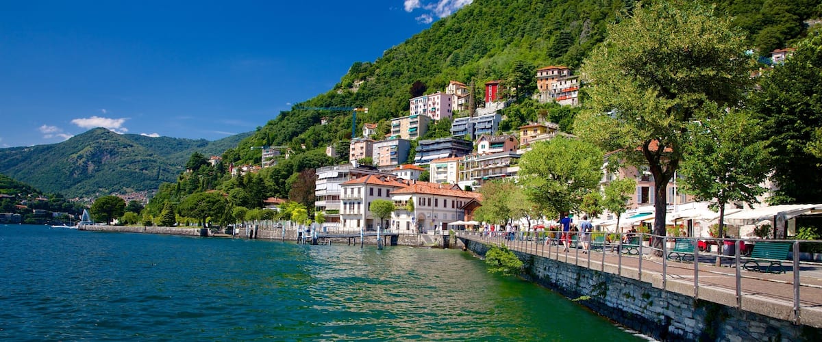 Como featuring a bay or harbour, a coastal town and a house