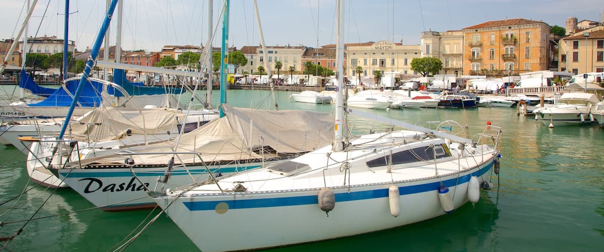 Desenzano del Garda which includes a marina, general coastal views and boating