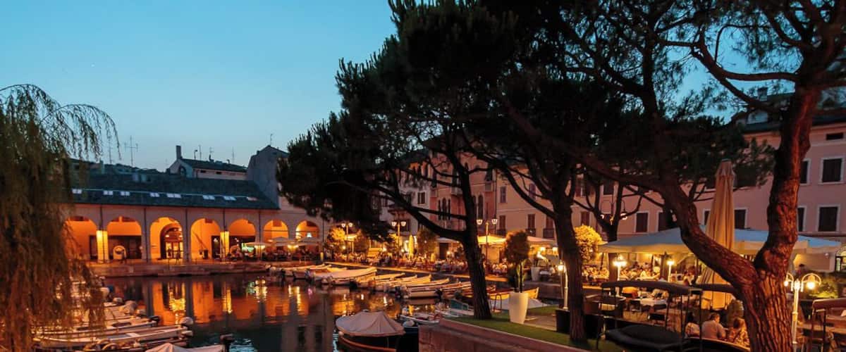 The Old Port (Porto Vecchio) in Desenzano del Garda seen at night.
This town is a wonderful place and even at night it is still a live and nice to walk round as can be seen from this photo.