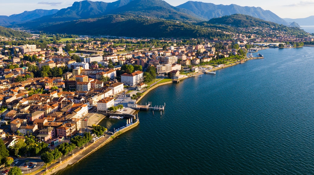 A coastal city with a river, surrounded by mountains.