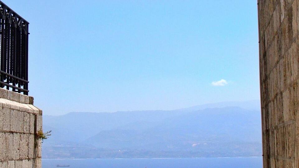 The Golden Madonnina, in the middle of the image, guarding the city and Messina port.
#Messina #statue