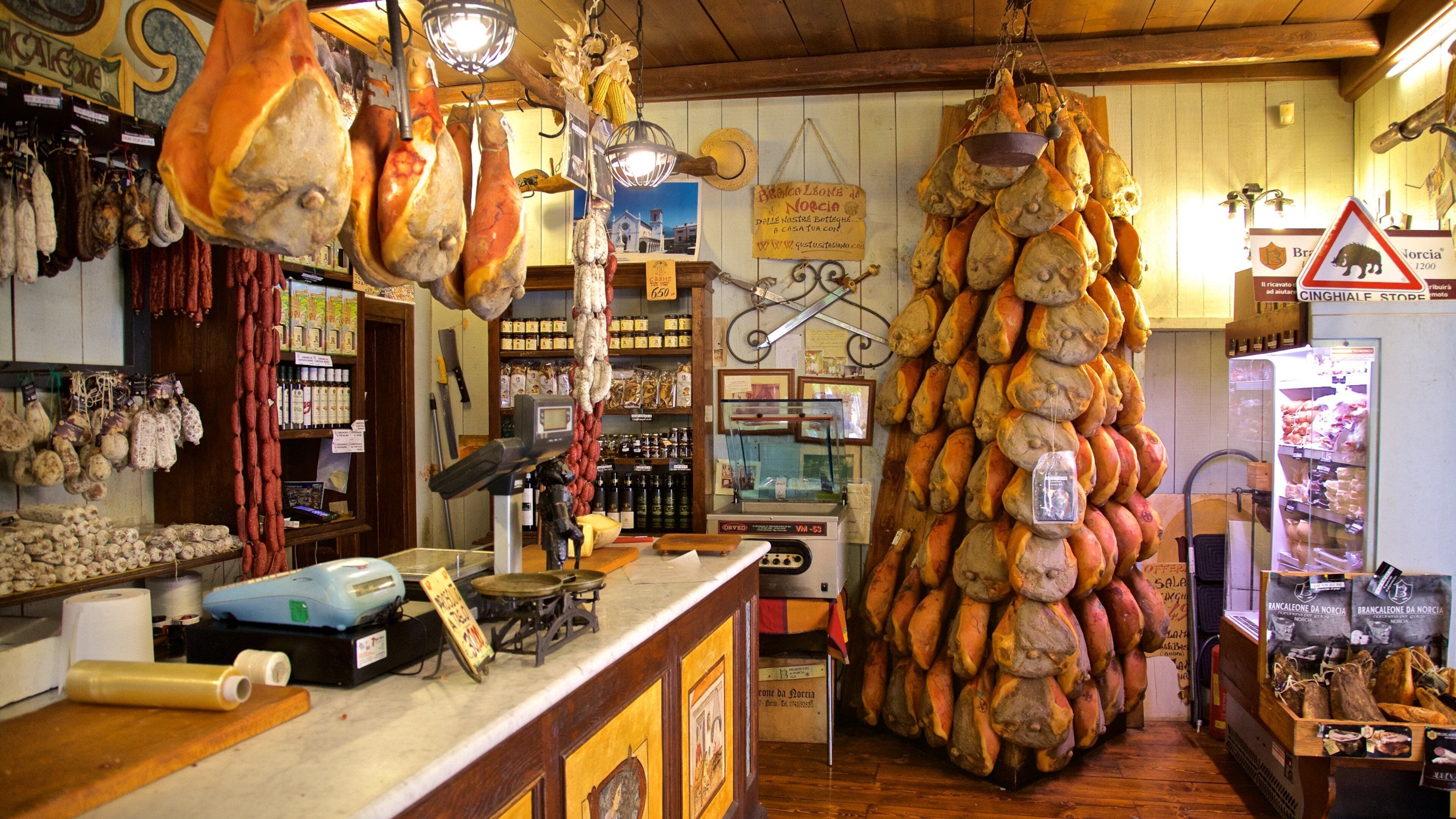 Norcia which includes food and interior views