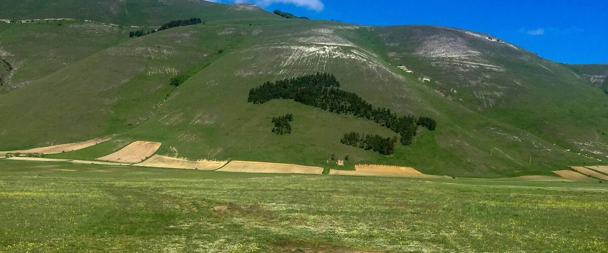 A mountainous landscape with a clear sky.