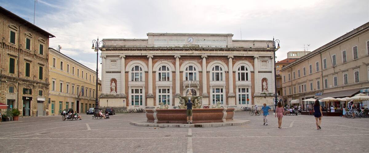 Pesaro which includes street scenes, a square or plaza and a fountain