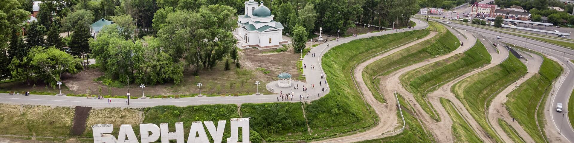 Barnaul, Russia. Description of Barnaul at the entrance to the city. Highland Park and a new embankment is the top view in summer.
