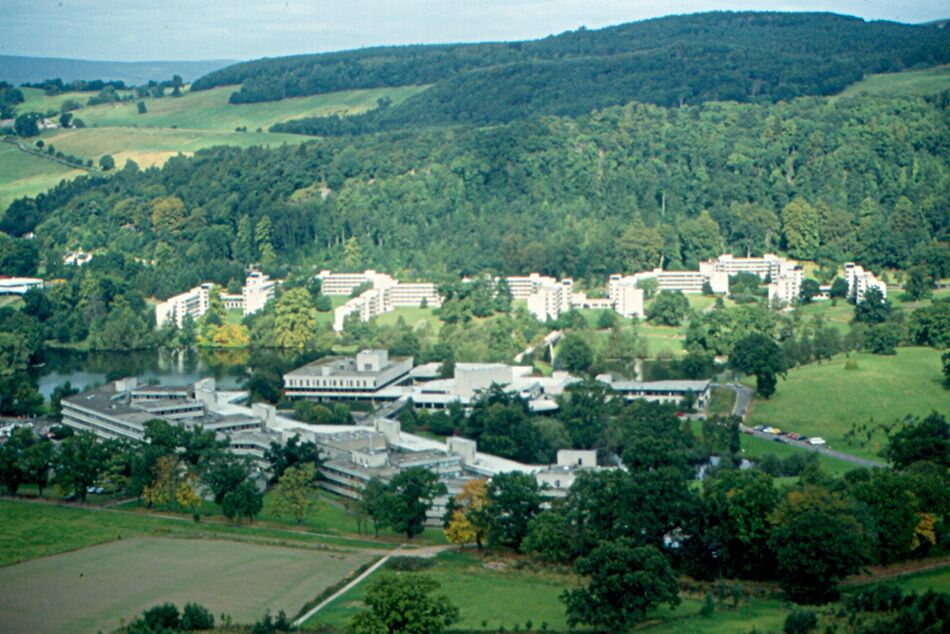 The University of Stirling was founded in 1967, and was still growing in 1990. This is the campus, seen from the Wallace Tower.