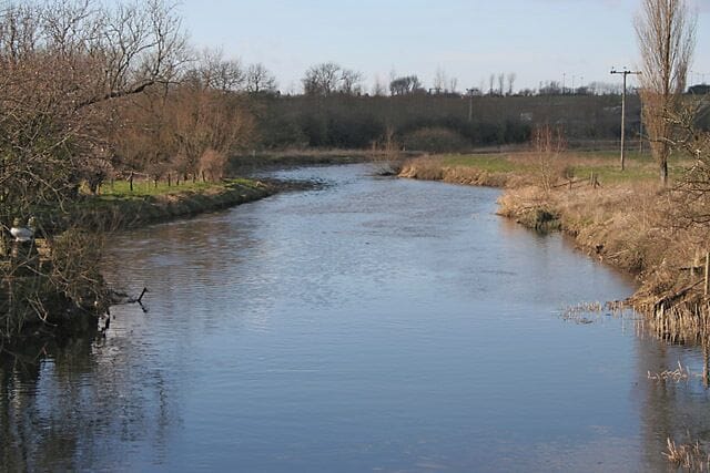 River Soar at Cossington Meadows. Looking NE towards the high ground and the A6 which is hidden amongst the trees.