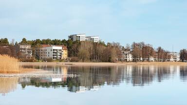 Modern Lakeside Buildings with Reflections in Täby, Sweden
