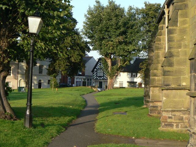 Castle Donington churchyard The north side of the church, looking towards Clapgun Street.