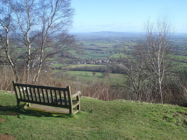 Seat on Black Hill View eastwards over Upper Welland to Bredon Hill. One of many seats with great views in this popular area of the Malvern Hills.