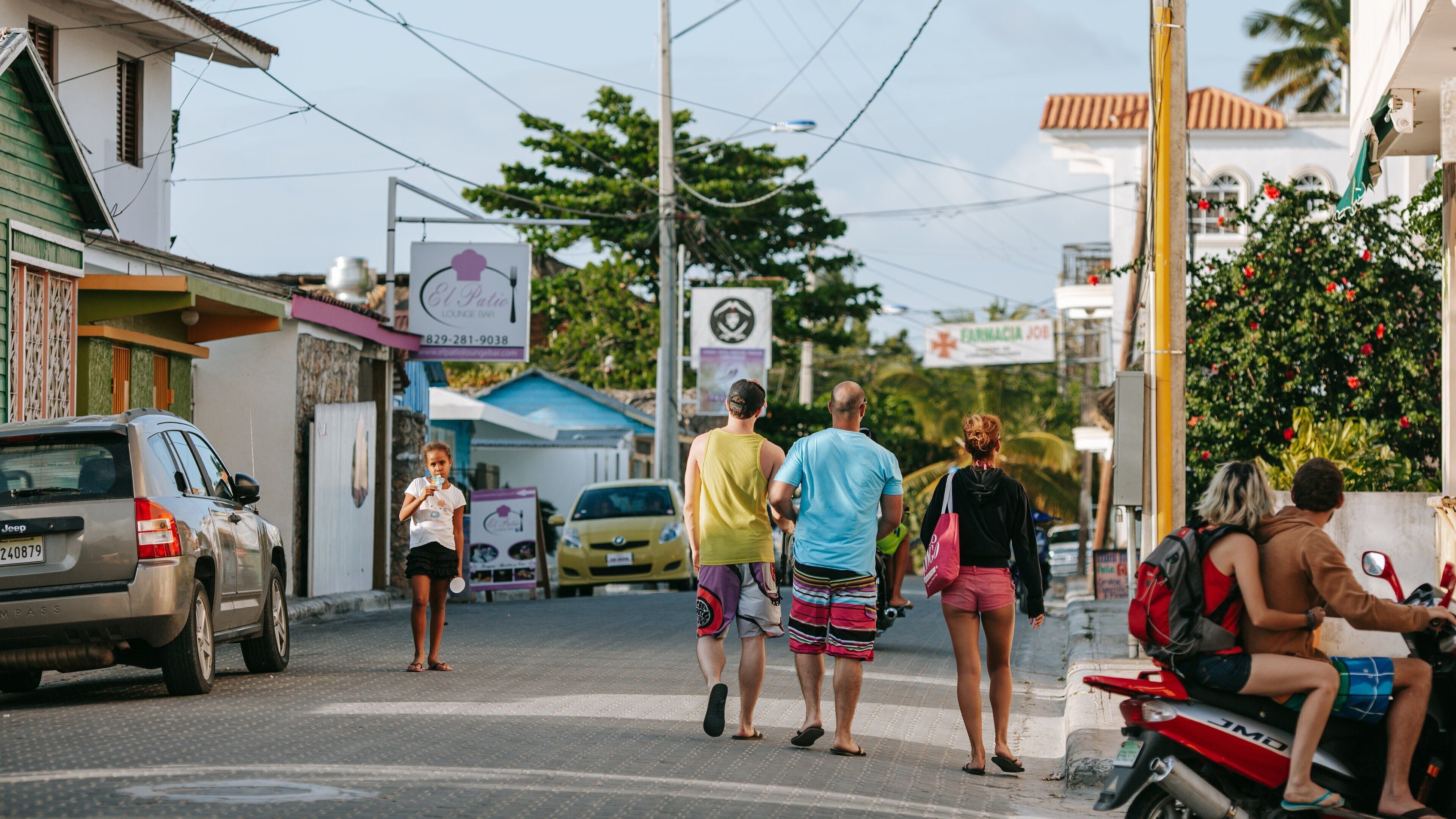 Dominican Republic showing a small town or village and street scenes as well as a small group of people