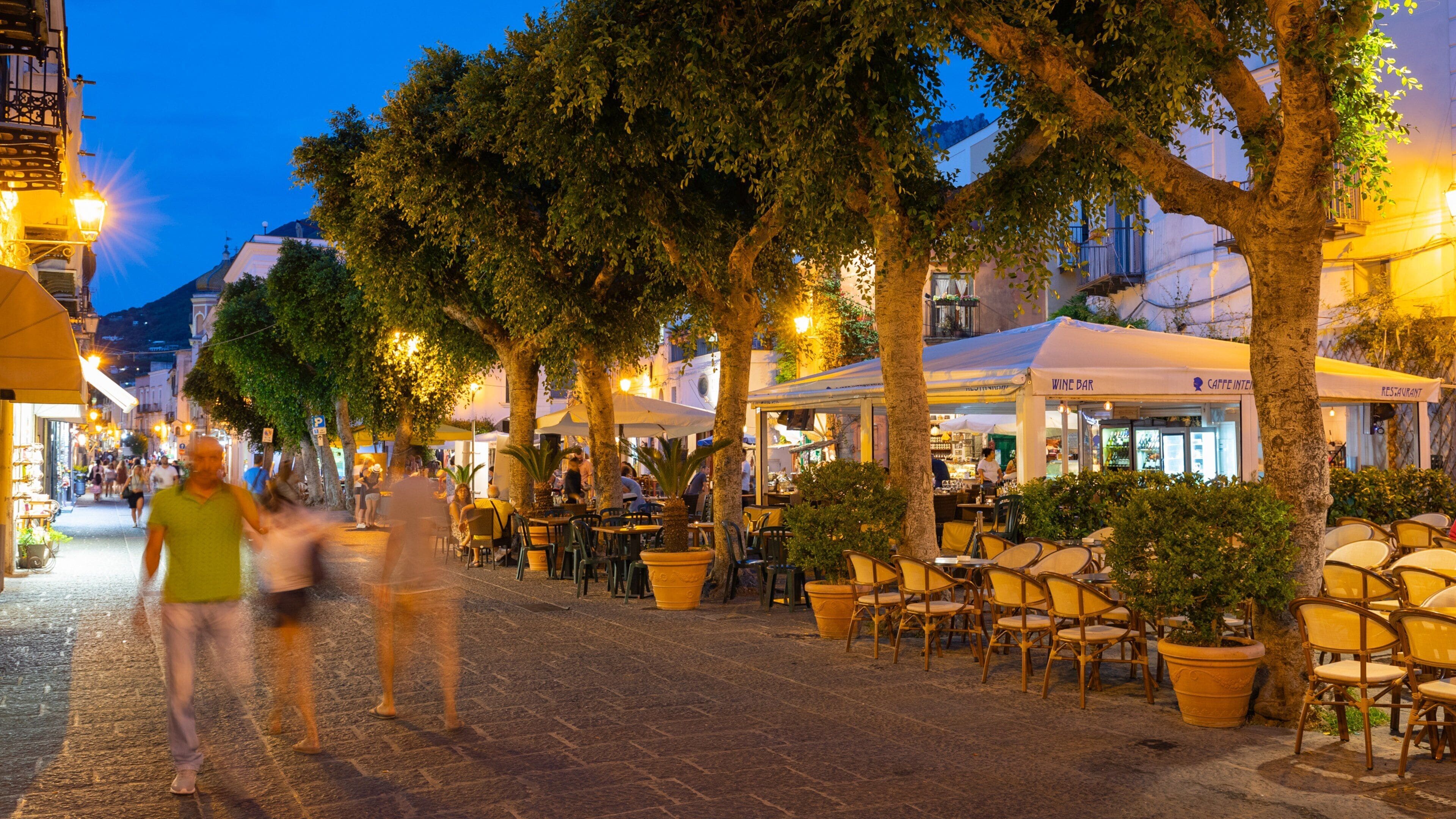 Forio d\'Ischia featuring street scenes and night scenes as well as a small group of people