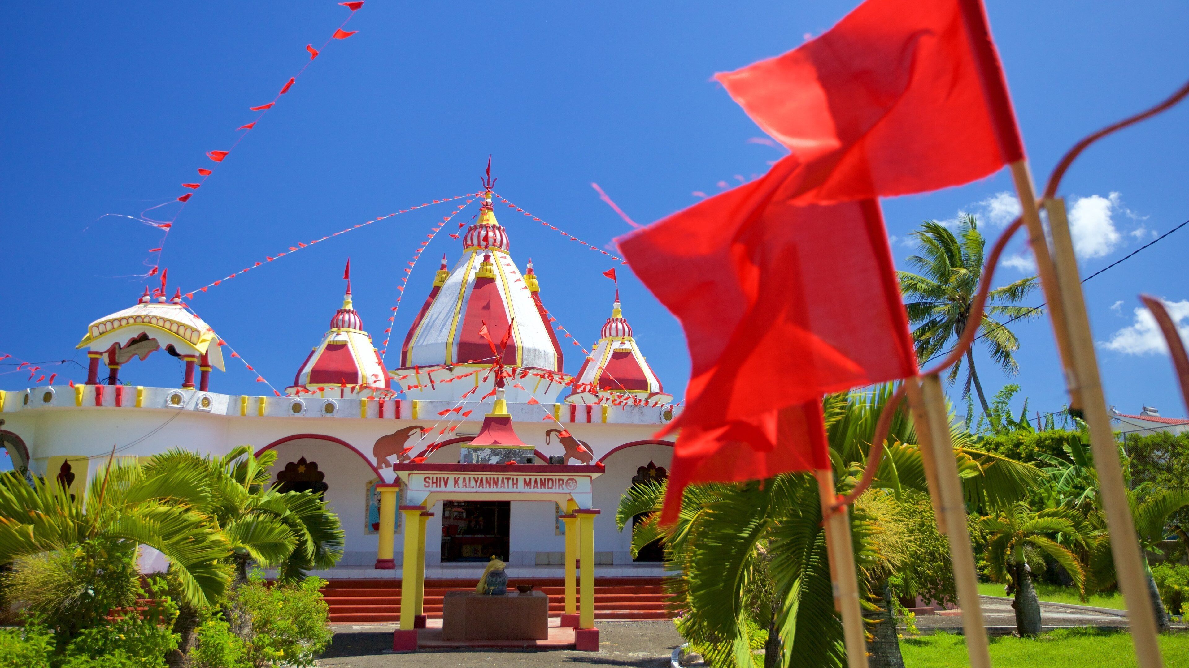 Grand Bay featuring religious elements and a temple or place of worship