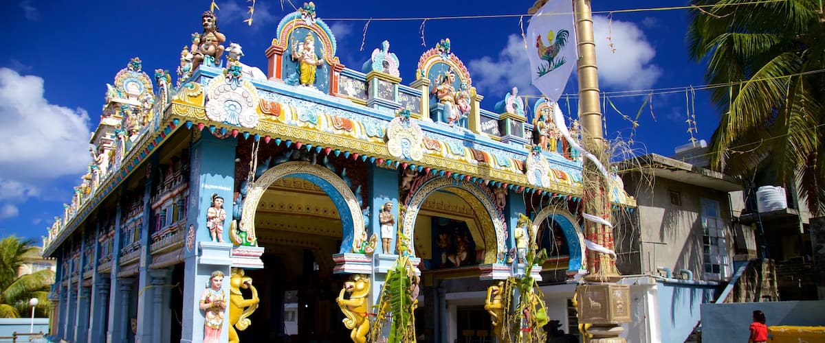 Grand Bay featuring religious aspects and a temple or place of worship