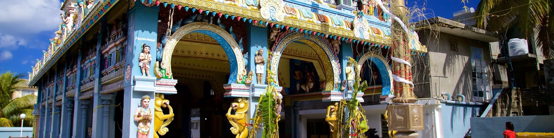 Grand Bay which includes a temple or place of worship and religious aspects