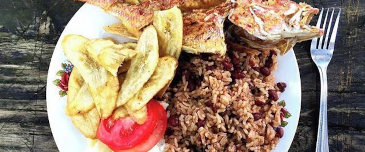 What's' that saying about "teach a man to fish"? Comida Catracho  Our lunch cooked by a family in the Jeanette Kawas Nacional Parque just outside of Tela, Honduras. You can't beat the fresh catch! Delicious!