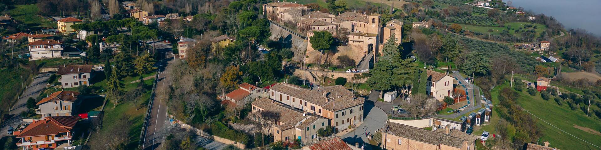 Italy, December 2022: aerial view of the beautiful medieval village of Montegridolfo in the province of Rimini in the Emilia Romagna region bordering the Marche region