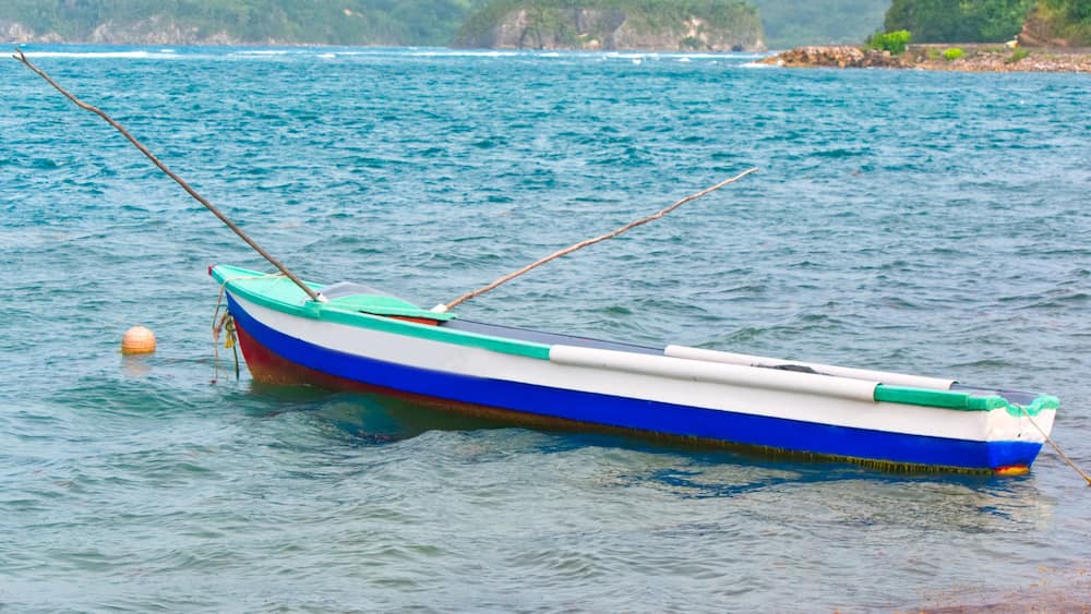 Boat in Caribbean Sea by Port Maria, St. Mary, Jamaica