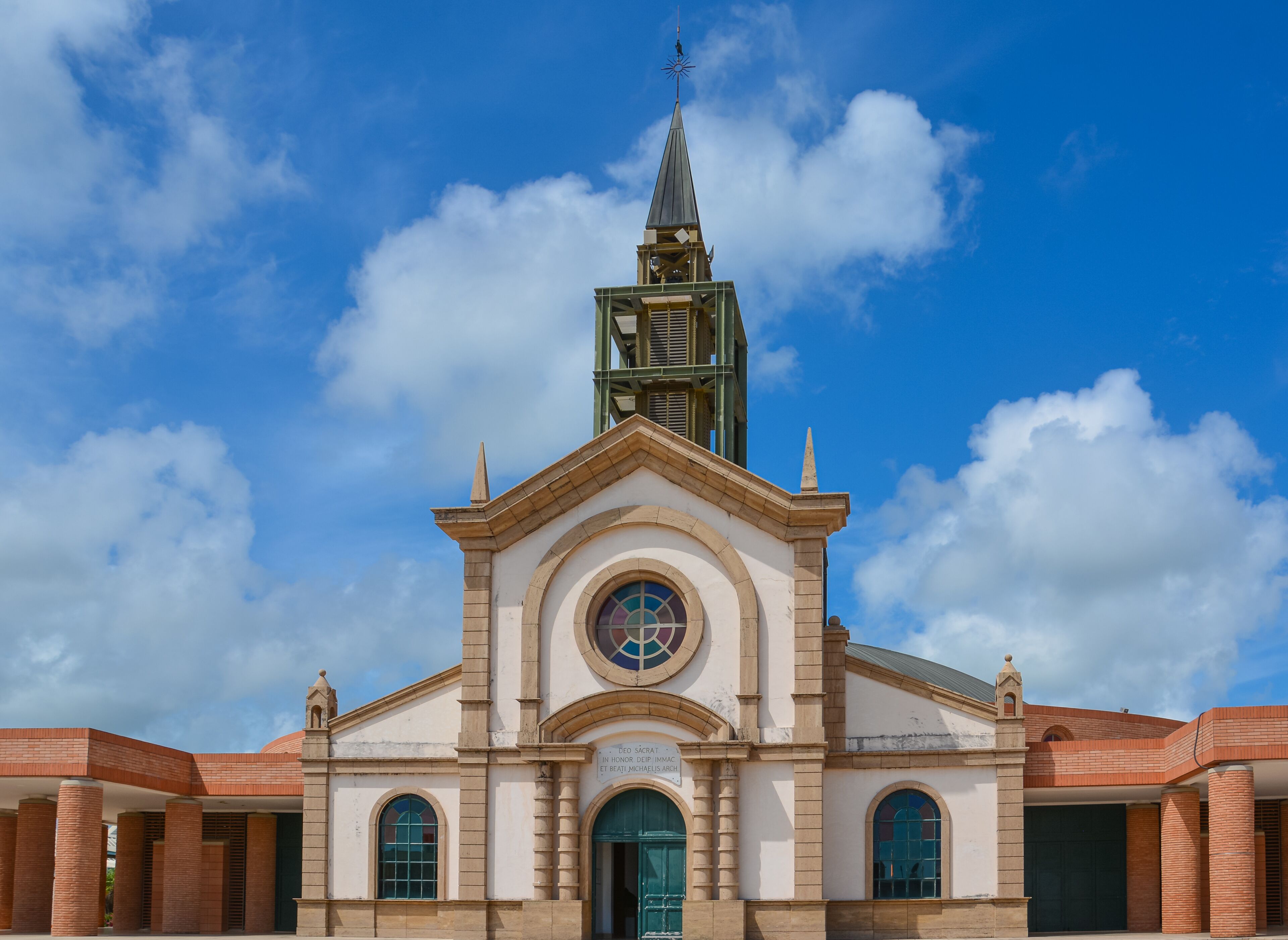 Le Francois, Martinique - September 18, 2018: Catholic Church of Saint Michael, Eglise catholique de Saint-Michel. Blue sky, white clouds. Copy space