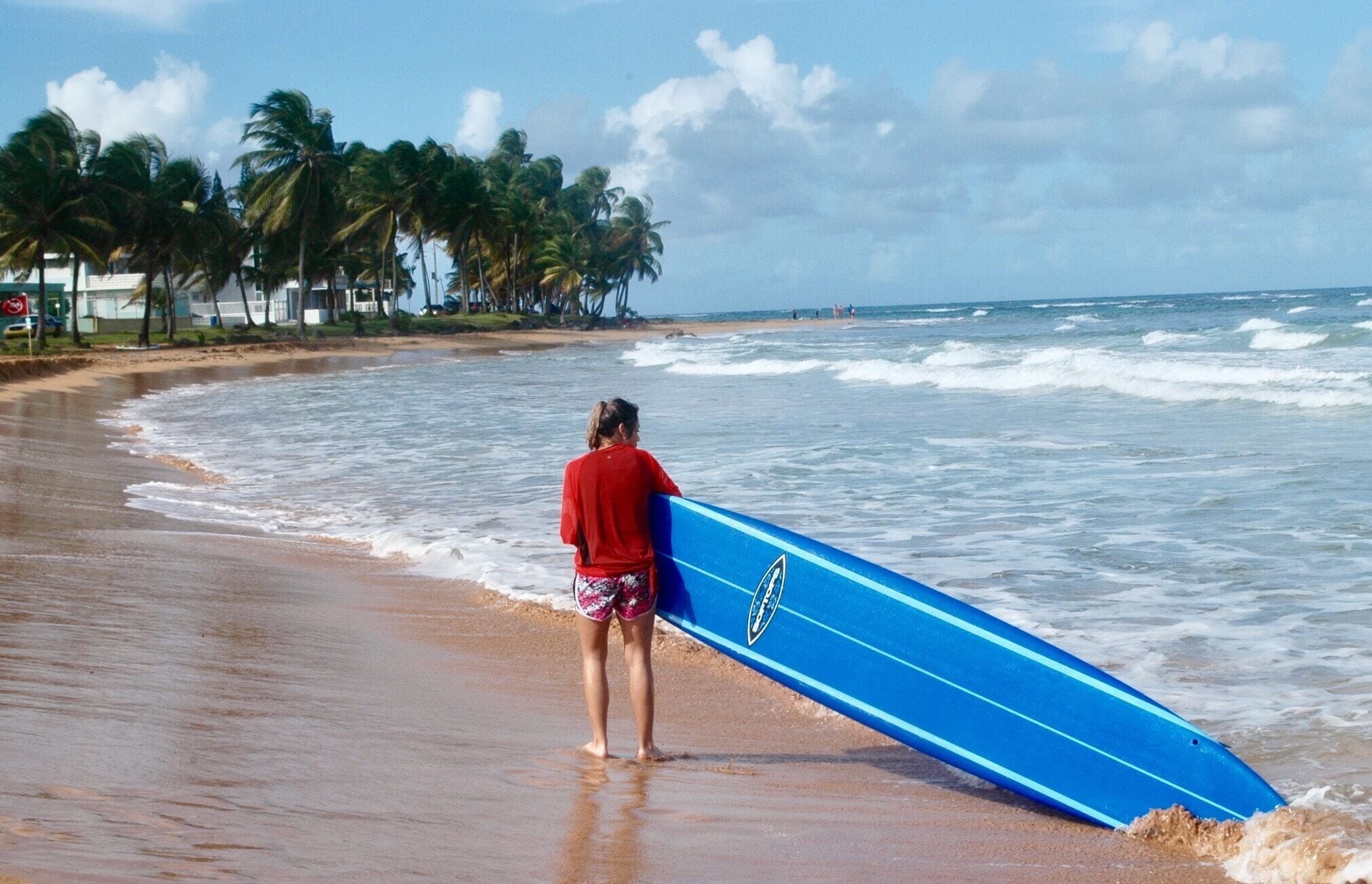 Surfing lesson at La Pared, Luquillo.  Weather in December! #beachbound #PuertoRicoSinFiltro #IslaLinda #BorinquenSoul #Kidsfun #Weekendgetaway #Roadtrip #TiratePR #Ruteandomiisla