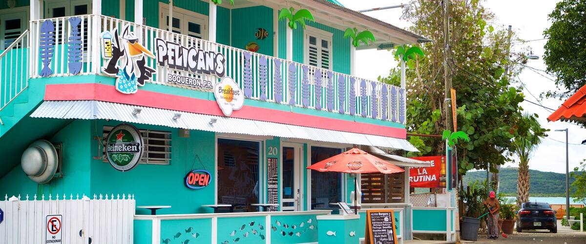 A turquoise building with a sign for Pelican's Boqueron, P.R.