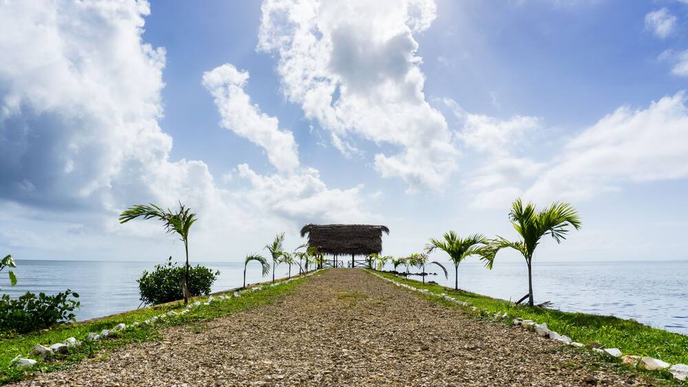 Cabana on a pier overlooking the Caribbean Sea in the town of Punta Gorda, Belize