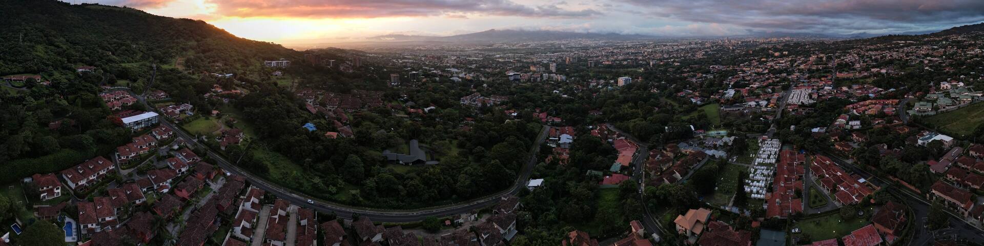 sunset over the mountains in escazu, costa rica