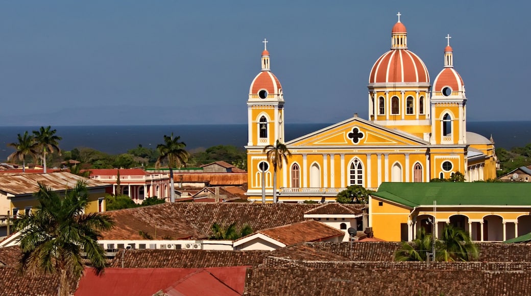 Granada which includes religious aspects, a city and a church or cathedral