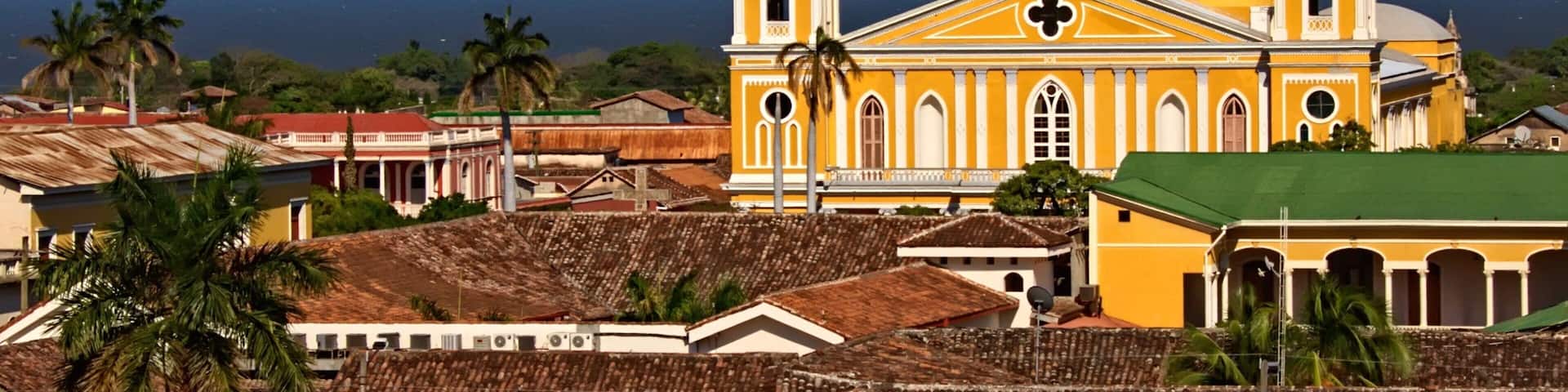 Granada which includes religious aspects, a city and a church or cathedral