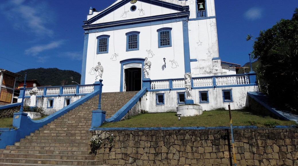 Beautiful church in Portuguese colonial style. It was inaugurated in 1806 and later reformed in the 20th century. It keeps inside a beautiful panel dedicated to Nossa Senhora D'Ajuda. Every year, in February, there is a great party dedicated to the patroness with quermesses and typical foods. On its exterior stand out for the statue of Christ crucified at the base of the staircase.