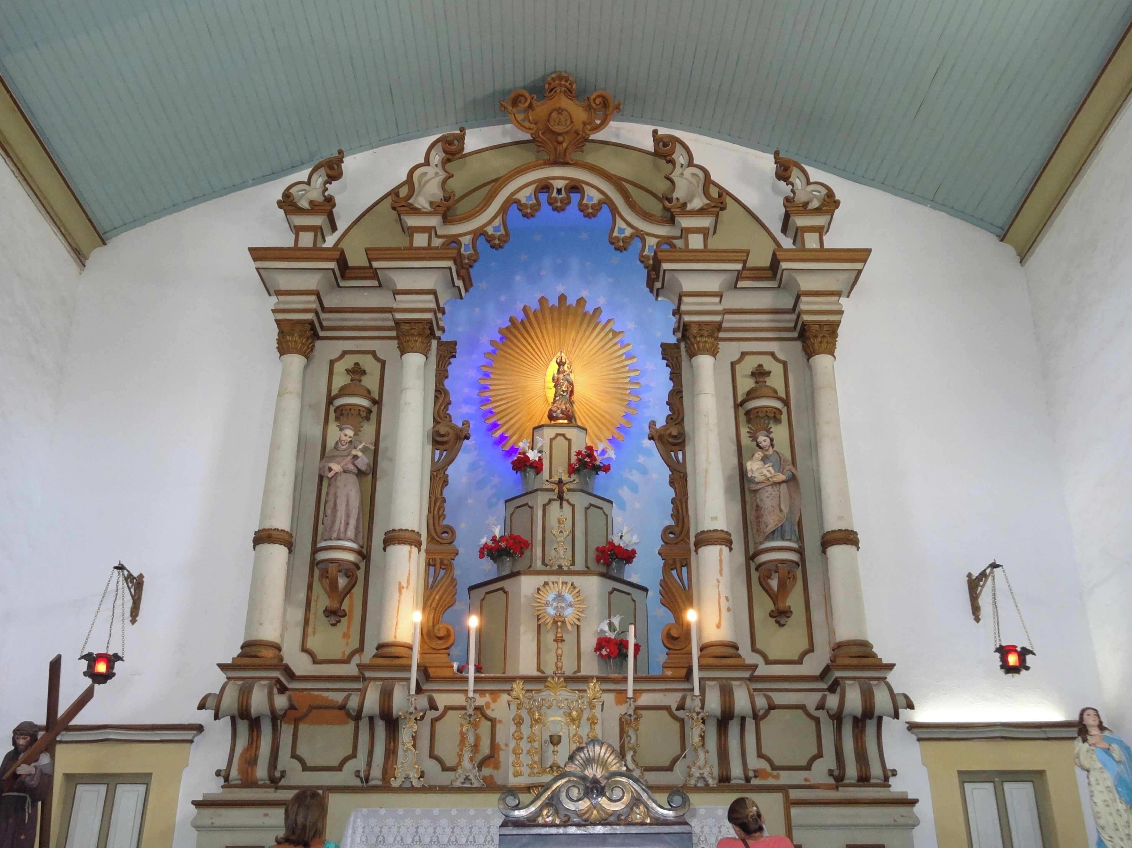 Beautiful church in Portuguese colonial style. It was inaugurated in 1806 and later reformed in the 20th century. It keeps inside a beautiful panel dedicated to Nossa Senhora D'Ajuda. Every year, in February, there is a great party dedicated to the patroness with quermesses and typical foods. On its exterior stand out for the statue of Christ crucified at the base of the staircase.