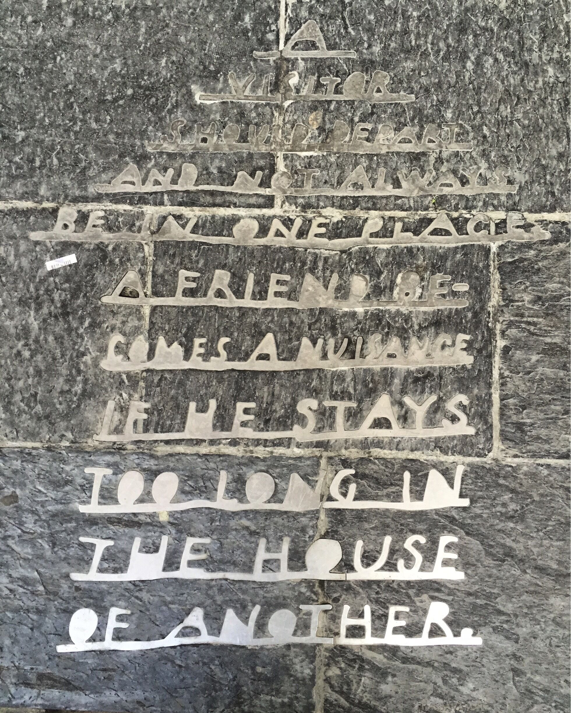 A visitor should depart and not always be in one place. A friend becomes a nuisance if he stays too long in the house of another. 
I found this on the platform of the train station at the airport.