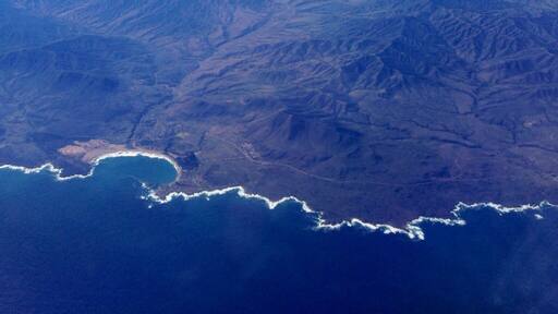 The #Chilean part of the #PacificOcean and #TheAndes Mountains in the background covered with #Snow