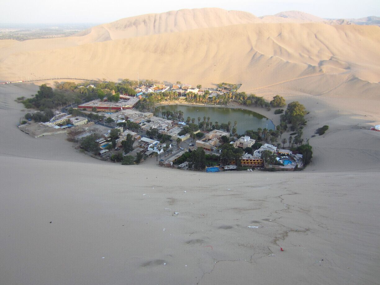 This oasis village near Ika, Peru, is absolutely worth the 4 hour bus ride from Lima. The dessert around it is really incredible to watch sunset. And be prepared for an awesome ride on sand dunes and for some sand boarding