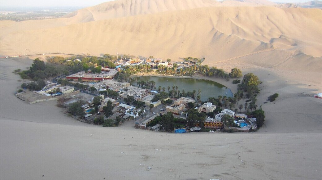 This oasis village near Ika, Peru, is absolutely worth the 4 hour bus ride from Lima. The dessert around it is really incredible to watch sunset. And be prepared for an awesome ride on sand dunes and for some sand boarding