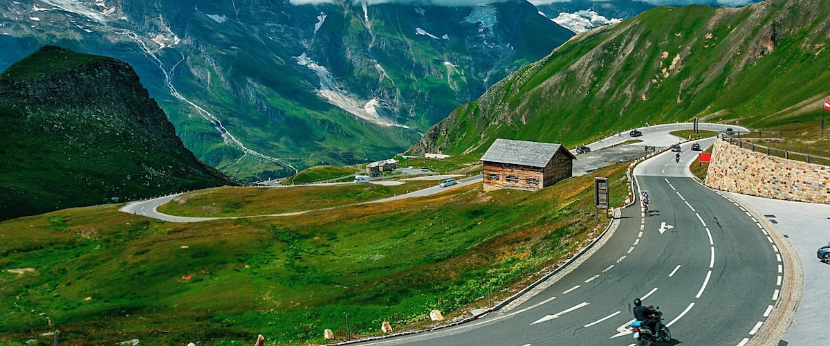 Grossglockner in Austria and High Alpine road.If you like driving this is place to visit.Specialy built for road race,closed in winter and you have to pay about 25euros to enjoy it.Well worth it!