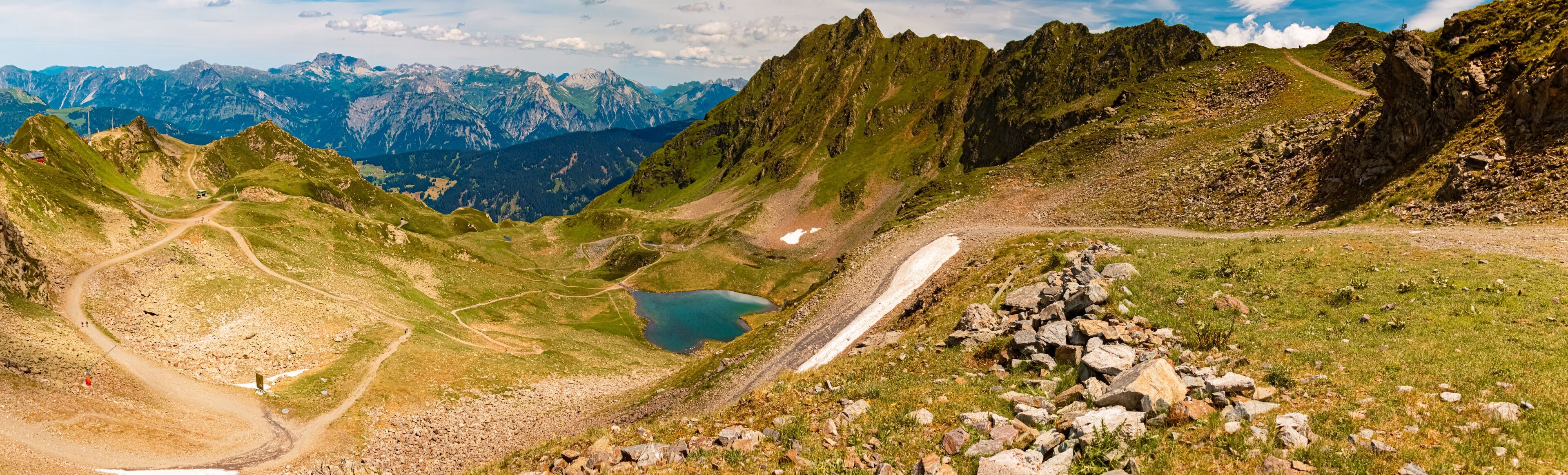 High resolution stitched alpine summer panorama at Mount Kreuzjoch, Schruns, Bludenz, Montafon, Vorarlberg, Austria