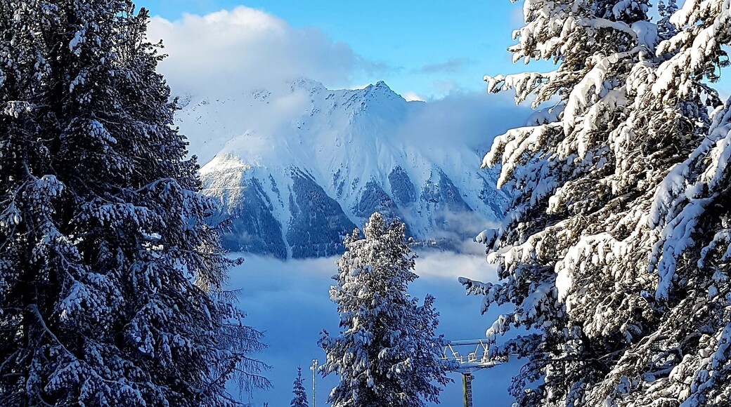 The view down to Nauder from the kids ski school nauders. Glories sunny day on top of the mountains