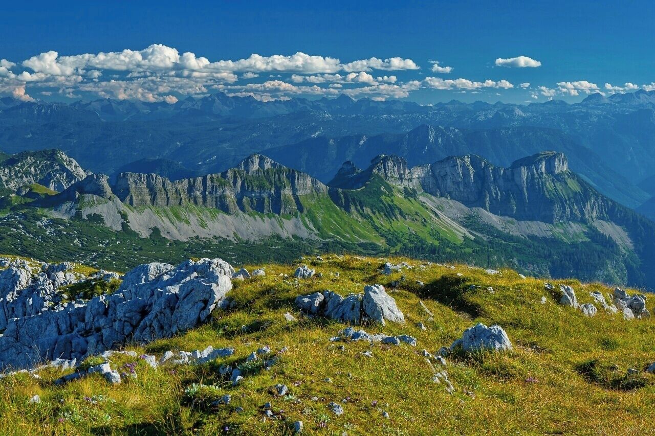 August 2012
Loser, Totes Gebirge

View of Loser massif in Totes Gebirge (= Dead mountain range) from Schoenberg peak (alt. 2.090 metres) north of it. Loser is 1.838 metres high and easy accessible from south via toll road to 1.600 metres. Totes Gebirge is part of Northern Limestone Alps. Behind it in background is the Schladminger Tauern range with most prominent summits of Hochgolling and Hochwildstelle, both over 2.700 metres high. 