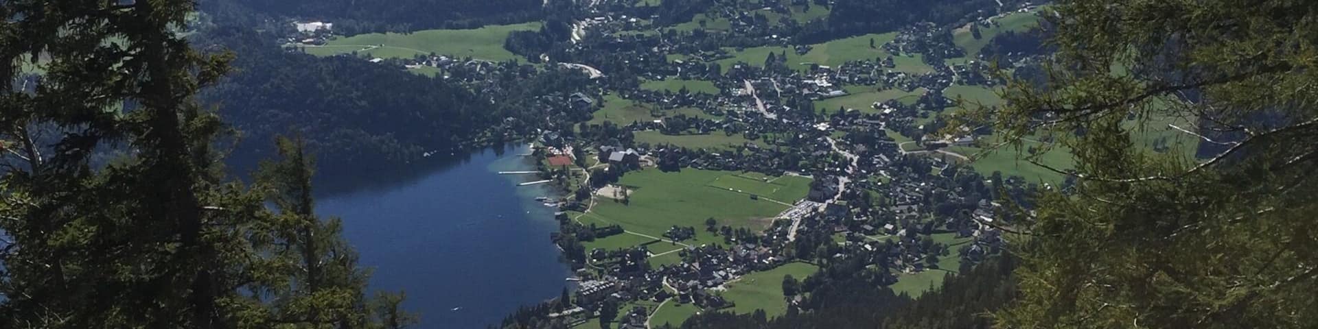 Altausee is a small village set in a beautiful valley on the shores of Lake Altausee. This is the heart of Austria, and close to the centre point of the mountainous country. The village of less than 2,000 inhabitants is picture postcard perfect, with well maintained wooden houses, almost all bedecked with flower boxes and hanging baskets. Not a country to live in if you don't have green fingers, I feel! On Sunday, the locals mostly wear their best leaderhosen, trachten jackets and
dirndls, creating a scene straight out of the Sound of Music. This is a spa resort, and the fantastic hiking and cycling trails means that it is a bustling local tourism destination.