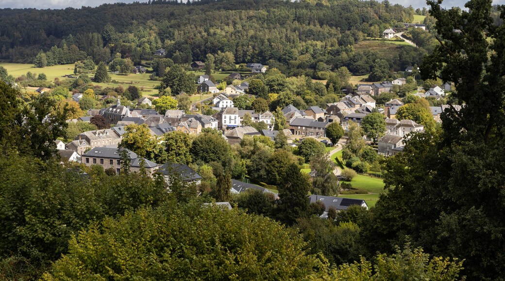 Aerial view of the village of Herbeumont, in the Province of Luxembourg in the Belgian Ardennes. Picturesque village surrounded by hills and forests. Copy space above and below.