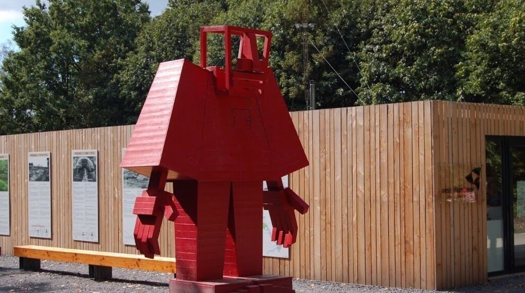 The entrance to the park by the restaurant and the information desk for Coming World Remember me.