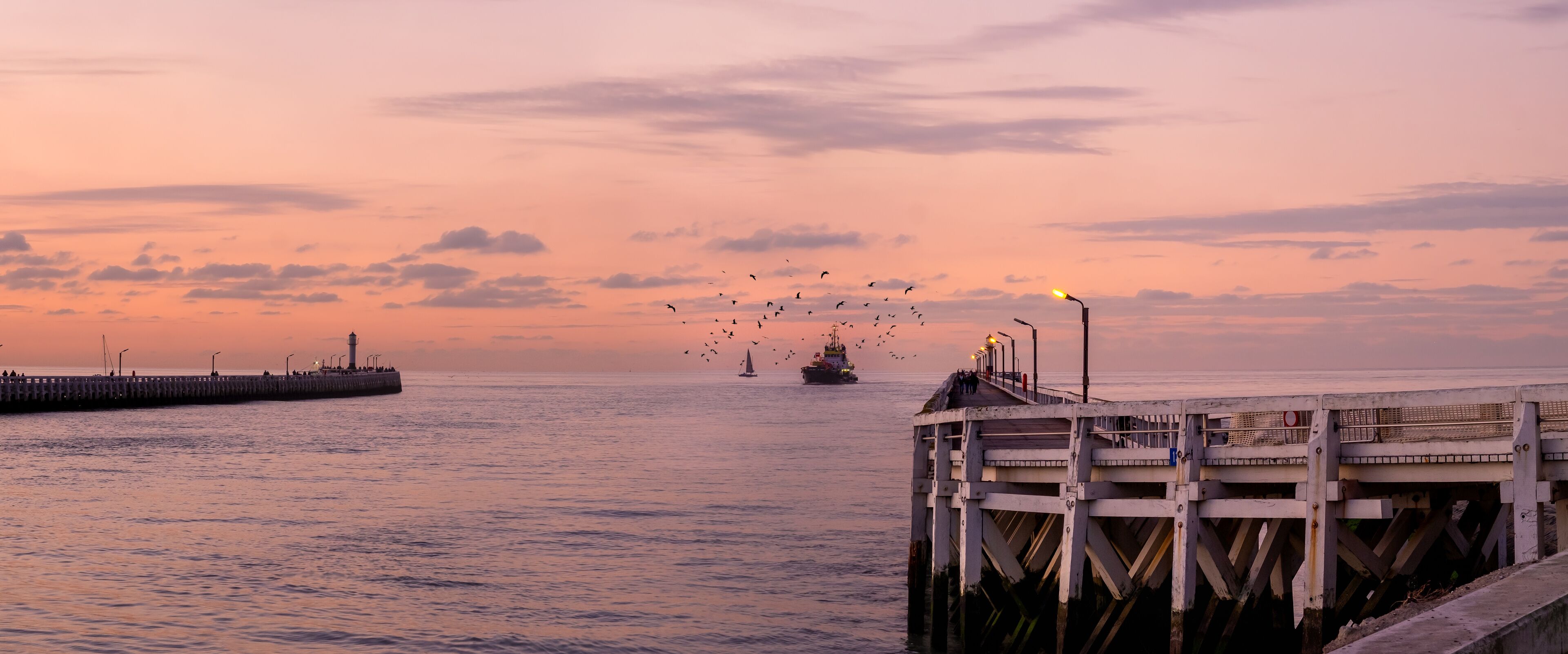 Fishing boat entering the port of Nieuwpoort on the Belgian coast.
