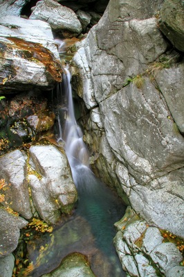 A waterfall by the way to Hubavetc hut.Golden autumn! Magic colors!