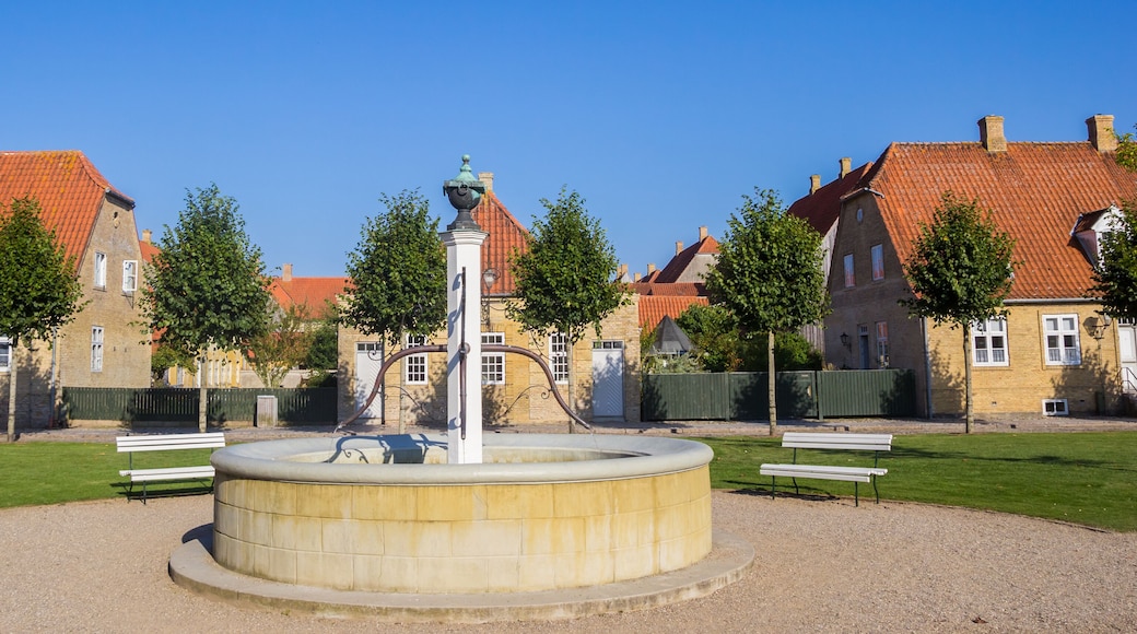 Panorama of the fountain and old houses in Christiansfeld, Denmark