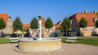 Panorama of the fountain and old houses in Christiansfeld, Denmark
