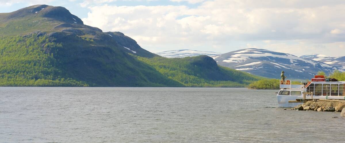 Kilpisjarvi featuring landscape views, mountains and a bay or harbor